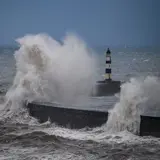 Seaham harbour with crashing waves over north pier